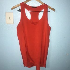 Orange flowy sleeveless top